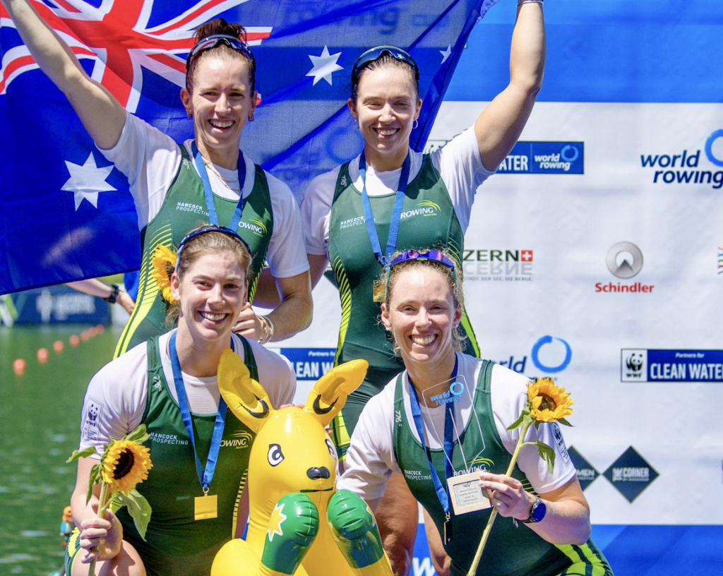 4 rowers with the Australian Flag